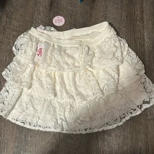 White justice skirt with shorts built in, floral printed